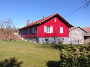 Construction bardage rouge d'une maison en Alsace dans le haut rhin (68)