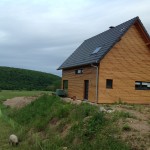 Maison en bois avec bardage horizontal en bois. Maison à ossature bois en Alsace