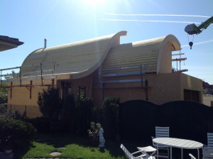 Extension maison à toit cintré en ossature bois